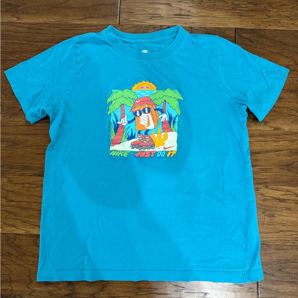 Nike Kids Turquoise Tee with Colorful Surf Graphic